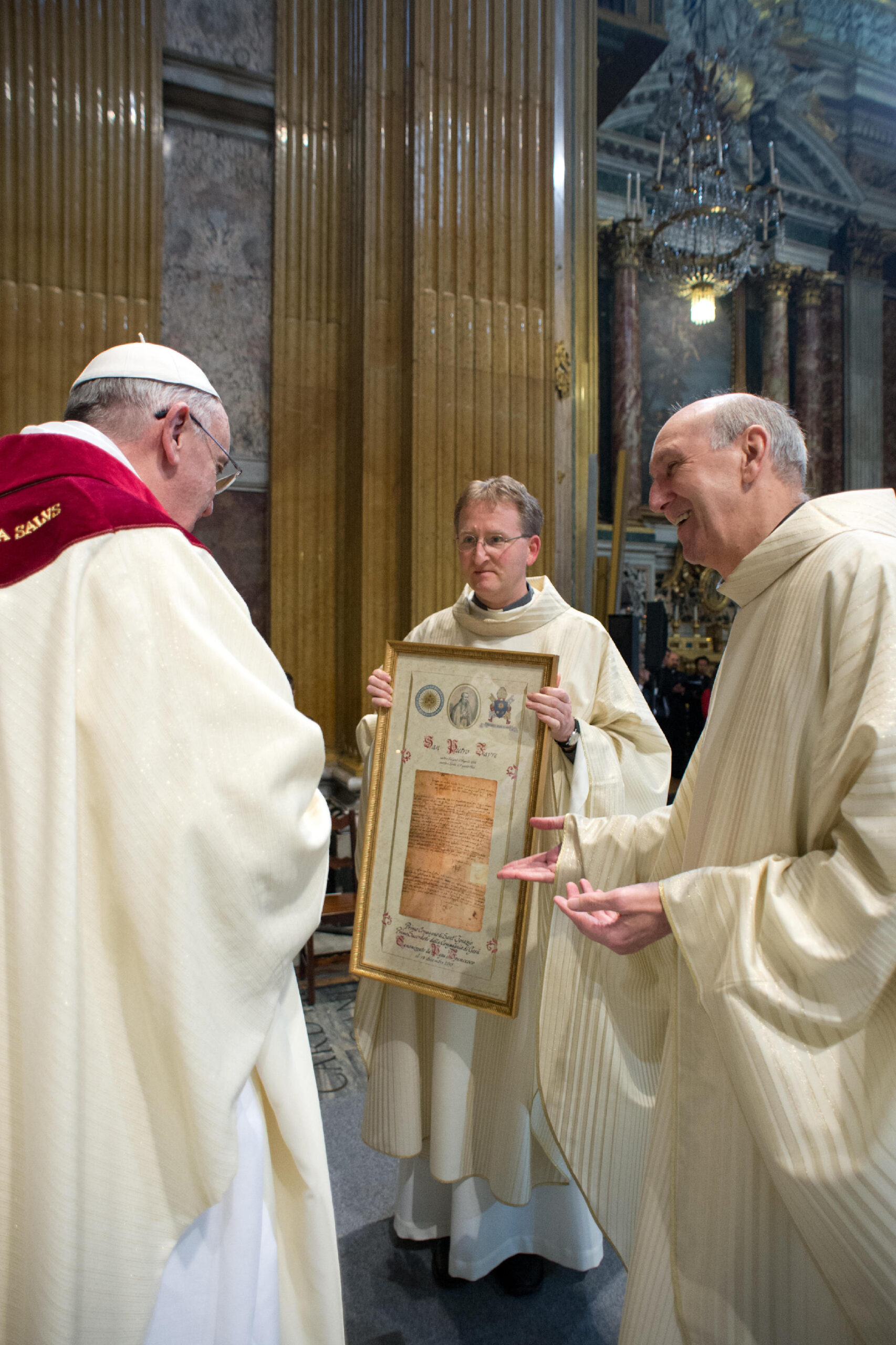 In this photo provided by the Vatican paper L'Osservatore Romano, Pope Francis celebrates a mass with the Jesuits on the occasion of the order's titular feast, in Rome's Jesus' Church, Friday, Jan. 3, 2014. (AP Photo/Osservatore Romano, ho)